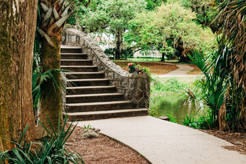 Langles stone bridge and pathway in City Park, New Orleans - obrazy, fototapety, plakaty