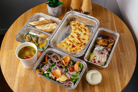 restaurant food in takeaway containers