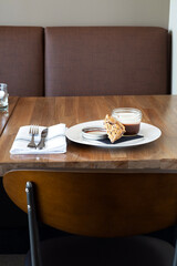 Restaurant dining room with dessert on table
