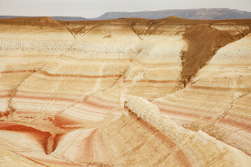 Unique geological feature known as tiger-striped mountains, showcasing layers of sedimentary rock...