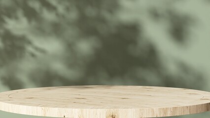 Empty round wooden table podium in dappled sunlight, leaf foliage shadow on green concrete wall for luxury organic cosmetic, skincare, body care, beauty product display background 3D