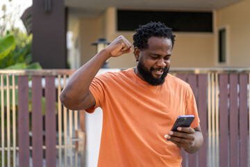 African man use smartphone of connectivity technology, digital engagement and active, digital...