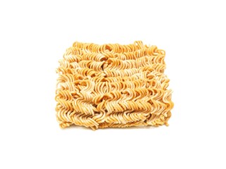 Blocks of dry instant noodles placed isolated on a white background.	