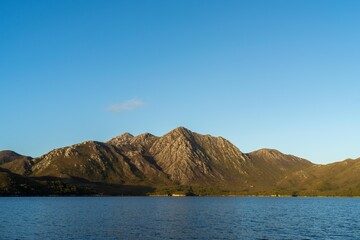 beautiful rock mountain above the ocean in a national park in australia