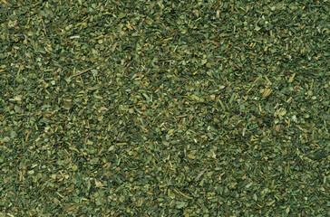 Dried Italian herbs, mixed herbs seasoning, top view background  - 773772101