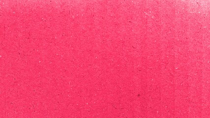 dark pink corrugated cardboard texture background.