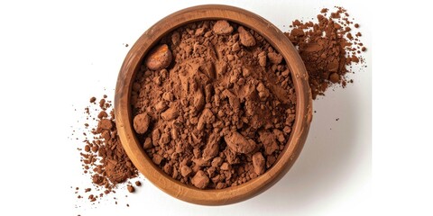 A bowl of brown powder with a white background