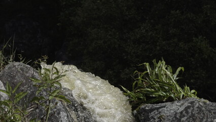 Slow Motion Waterfall Cascading into Darkness with Copy Space