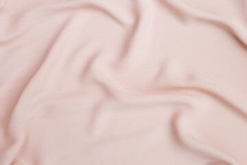 Closeup waving pink fabric background, blank pink fabric texture background