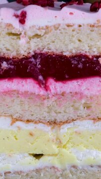 strawberry poppy cake with cream in a plate on aon a blue background. High quality 4k footage