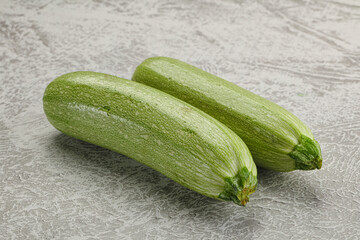Raw green ripe zucchini vegetable