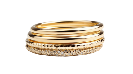 A luxurious stack of gleaming gold rings on a pristine white background