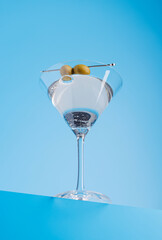 Classic martini against a cool blue background