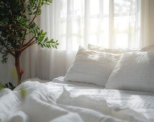 White bed with white pillows and quilt in a bedroom interior, in a closeup