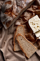 goat or sheep cheese and bread on the table