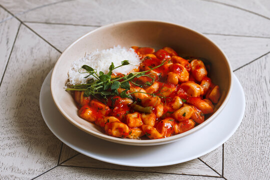 Tortellini pasta with tomato sauce and parmesan cheese