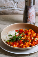 Tortellini pasta with tomato sauce and parmesan cheese