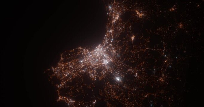 Palermo (Italy) top view at night. View on modern city from satellite. Camera is zooming in, rotating counterclockwise. Vertical video. The north is on the left side