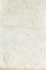 detail of the texture of a whitewashed cement wall, design background