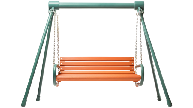 A green and orange swing with chains suspended in a lush forest setting