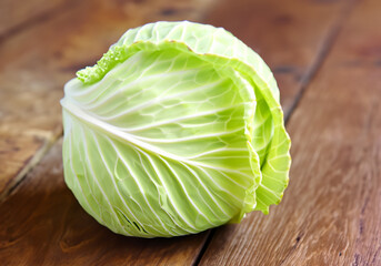 Close up cabbage on wooden - 773832565