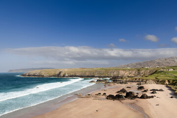 The vast expanse of Durness Beach in Scotland is depicted here, with its azure waters and golden...