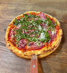 Pizza. Italian Cuisine. Dinner at the restaurant. Tasty food. Food colors. Italy.