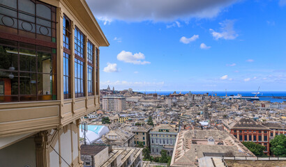 Genoa cityscape: panoramic view from Spianata Castelletto with the Art Nouveau public lift, Italy. - obrazy, fototapety, plakaty