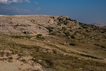 Fototapeta na wymiar Hilly landscape of the croatian island of Pag on the Mediterranean Sea