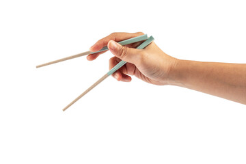 Hand holding chopsticks isolated on a transparent background