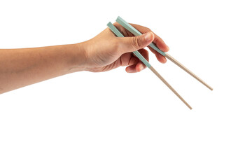 Hand holding chopsticks isolated on a transparent background