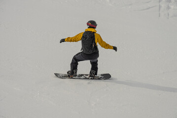 Ski, Snowboard freeride i deep powder snow. Gudauri Georgia Caucasus resort. Freeride in Caucasus mountains. Freeride snowboarding in winter. Heliboarding freeride. Riding in powder on snowborad.