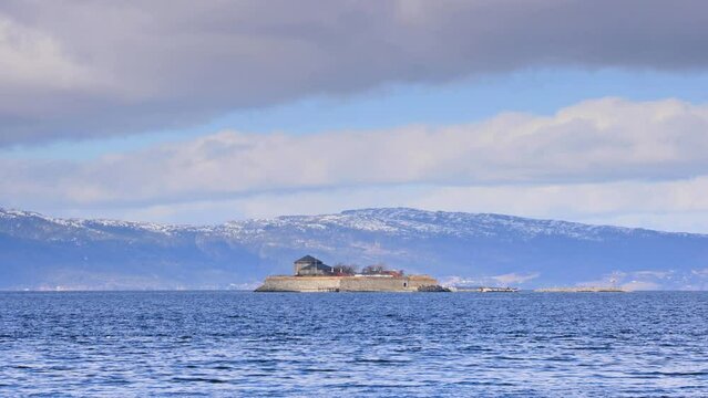 Munkholmen Island.  Munkholmen (Monk's Islet) is a small island located off the Norwegian city of Trondheim.  Benedictine monks built a monastery on the island in the early 11th century.