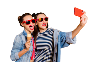 Two glad positive leisure lifestyle dreamy carefree careless lovely cute sweet brunette hair lady in stylish glasses spectacles isolated on yellow wall take picture on cellular make wide open mouth