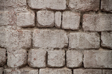 Texture of an old brick wall. Vintage background.