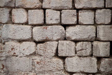 Texture of an old brick wall. Vintage background.