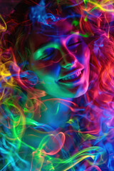Cheerful woman with a joyful expression, smiling as colorful lights illuminate her face