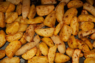 baked potatoes. Golden texture. Potatoes in the oven.