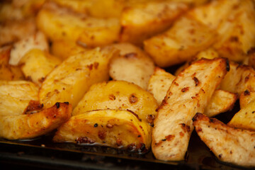 baked potatoes. Golden texture. Potatoes in the oven.