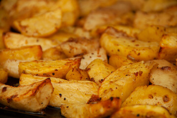 baked potatoes. Golden texture. Potatoes in the oven.