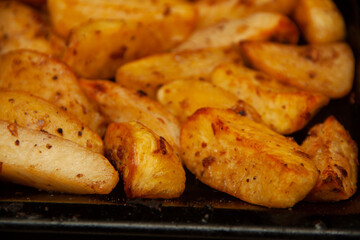 baked potatoes. Golden texture. Potatoes in the oven.