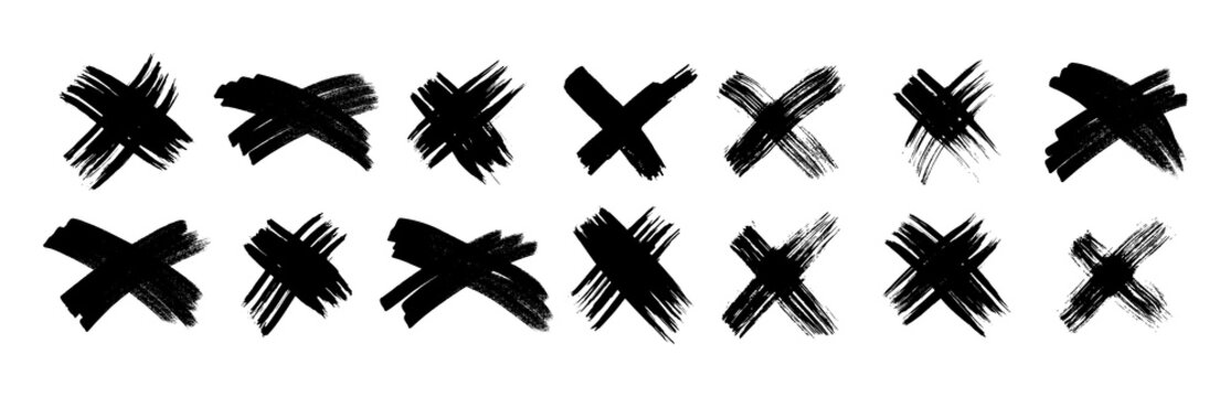 Set of black brush cross symbols