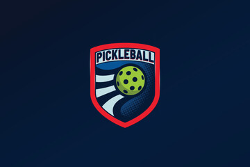 an attractive and eye catching pickleball logo with a combination of a moving ball and a shield. This logo is suitable for communities, clubs, training, events, etc.