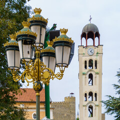 Streetlamp, church tower and fortress walls, Skopje