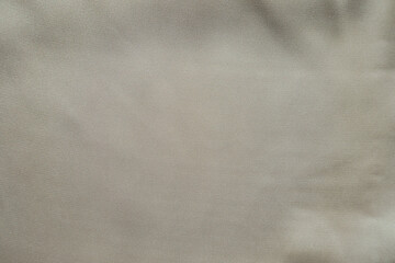 Smooth surface of simple light beige rayon fabric