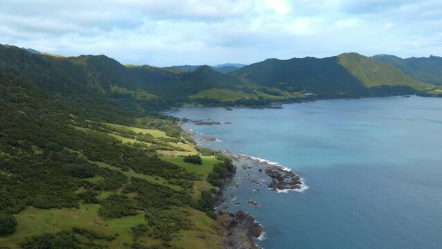 Farmland and headland on Hicks Bay, Bay of Plenty, New Zealand.