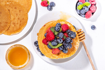 Stack of pancakes with berries
