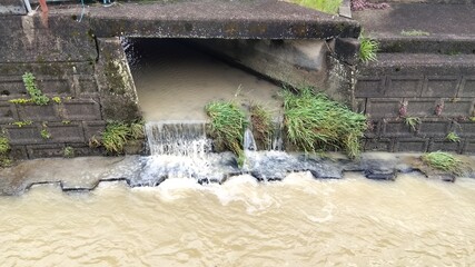 Muddy stream, Kyoto, Japan
