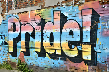 graffiti on the wall with "Pride"