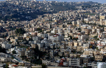 A mountain view of one side of the rural city of Salt, located between a group of mountains in Jordan